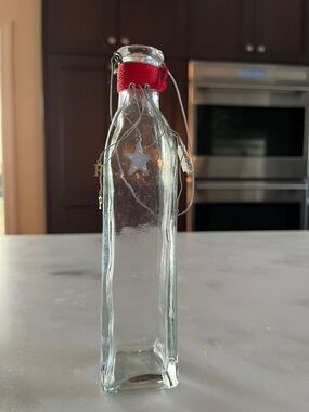 Clear Glass Decorative Bottle/Jar with Red Neck Accent and the Letters "HOPE"